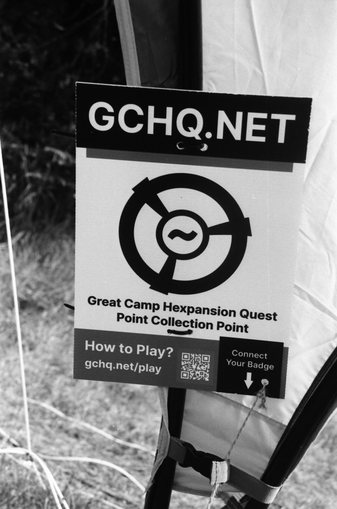 A GCHQ.NET sign, part of the Great Camp Hexpansion Quest game.